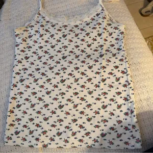 Brandy Melville White Floral Tank Top thumbnail 1
