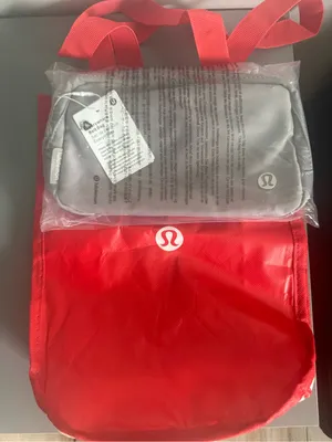 lululemon light grey travel pouch with red packing sleeve thumbnail 4