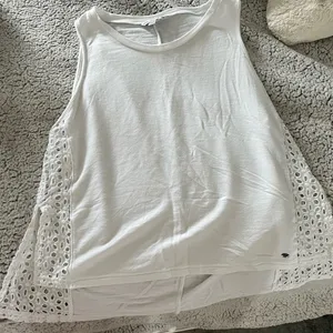White tank thumbnail 1
