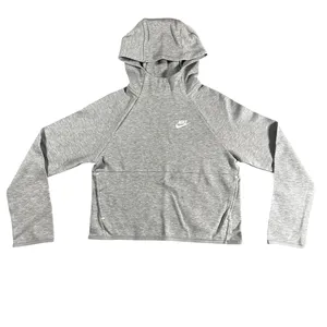 Nike Gray Minimalist Hoodie XS Y2K Athleisure Streetwear Description: Soft gray Nike hoodie with embroidered logo and kangaroo pocket. Perfect minimalist, gorpcore, streetwear, gym, and casual layering essential. Pre-owned Condition: Excellent Flaws: No significant flaws observed. Stored: Model created by AI. NikeHoodie Streetwear Athleisure MinimalistStyle Gorpcore HeatherGray Pullover LogoHoodie Layering Y2K thumbnail 2