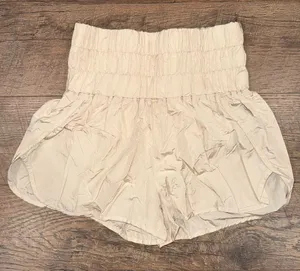FP Movement by Free People High Waist Champagne Gold Lined Workout Shorts thumbnail 1