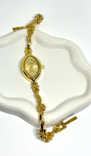 Dainty Gold Tone Bow Watch thumbnail 1
