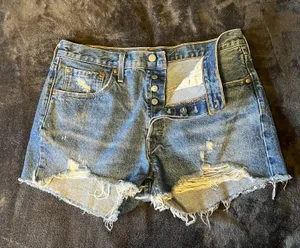 Levi’s 501 cut-off distressed button denim shorts 32 thumbnail 1