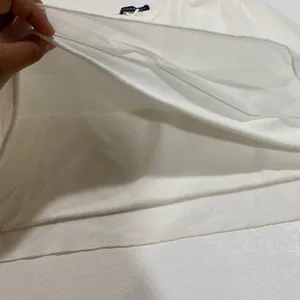 Brandy Melville White Mini Skirt Women’s Size 2 (Fits XS/S) thumbnail 8