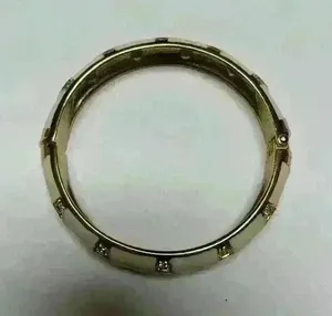White enamel bracelet with gold/rhinestone accents‎ thumbnail 1