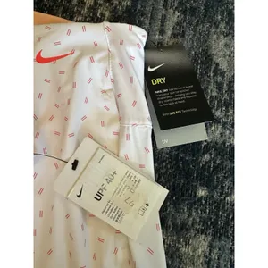 Nike Women's Dri-Fit Victory Golf Skort White Orange UPF 40+ Pockets Size Small NEW thumbnail 3
