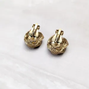 Vintage Clip On Earrings Gold Tone Patterned Knot Design - Fair Condition thumbnail 6