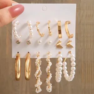 Elegant Gold and pearl earring set thumbnail 1