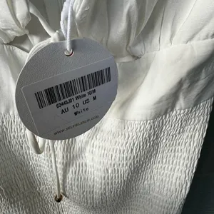 Selfie Leslie APEROL SPRITZ SHIRRED BODICE PUFF SLEEVE MINI DRESS WHITE M NWT thumbnail 6