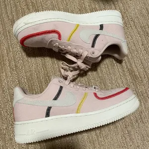 Pink Nike stitched Air Force ones thumbnail 1