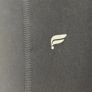 Fabletics PowerHold High Waisted Compression Leggings Black Women 7/8 Length thumbnail 4