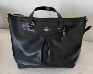 Woman’s coach bag thumbnail 1