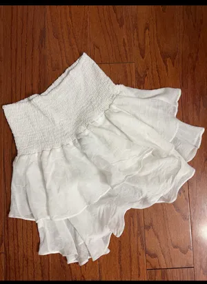 SHEIN tiered ruffle mini skirt smocked high waistband - Size Medium. ***Refer to measurements. Super cute skirt. Gently warn & excellent condition. Goes with anything. Does not include underneath shorts. Measurements approximately 12.5” waste x 17” long. Non-smoking home. Priced at as is condition. Don’t like my price make a reasonable offer! And thank you for checking my closet! thumbnail 2