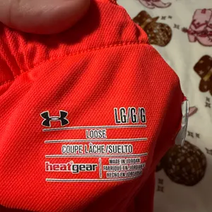 Under Armour Women's Vibrant Pink Athletic Shorts thumbnail 3