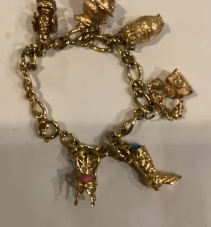 Vintage Avon Goldtone charm bracelet thumbnail 1