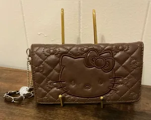 A Rare Vintage Dark Brown Sanrio 2013 Hello Kitty Quilted Faux Leather Wallet thumbnail 1