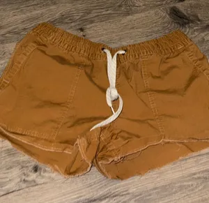 Vuori Women's Drawstring Shorts in Burnt Sienna thumbnail 1