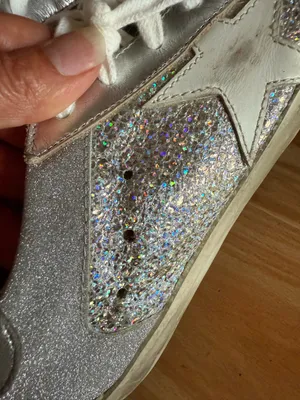 GOLDEN GOOSE Super-Star Iridescent and Glitter Leather Sneakers - Sz 38 - US 7 1/2 These are in good condition with light wear throughout. They are a pretty hard to find but super cute style. They have like holographic leather and glitter areas. Please see pics for details. Metallic leather upper Round toe Lace-up closure White leather star Cushioned insole; unlined Rubber sole Made in Italy thumbnail 12