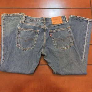 Levi’s 551 women’s medium wash jeans 27 thumbnail 7
