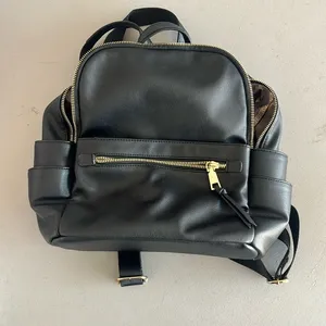 Black backpack thumbnail 1