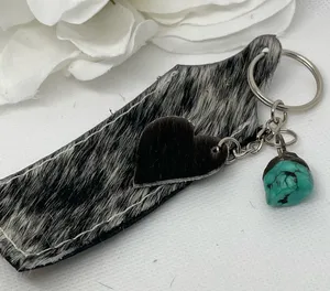 Cowhide chapstick holder. Attach to purse or backpack to keep it handy! thumbnail 1