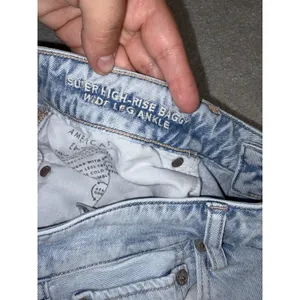 american eagle super high rise baggy wide leg ankle 14 Short Distressed Lt Wash thumbnail 4
