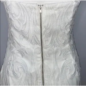 Bardot white lace midi dress Scalloped Vneckline with afitted sheath silhouette. thumbnail 11
