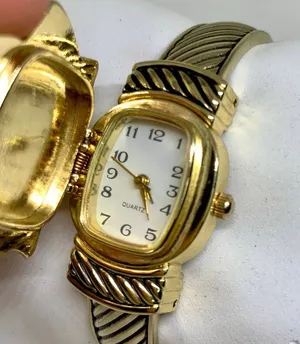Vintage Gold Tone Enamel Poinsettia hidden face Cuff Style Watch 22mm running thumbnail 1