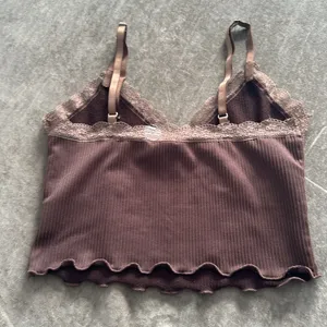 Divided H&M cropped ribbed tank top with lace trim. Color- brown. Size small thumbnail 3