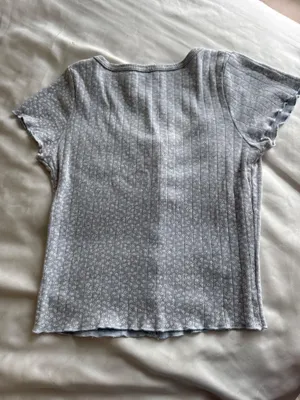 Light blue with white flowers Brady Melville shirt thumbnail 2