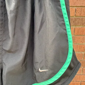 Nike Dri-Fit Tempo 10K Running Shorts Women Black Multi Color Stripe Size Small thumbnail 2