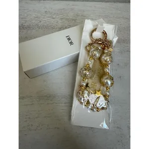 Dior NIB VIP Pearl Gold Star Holiday Bag Charm thumbnail 4