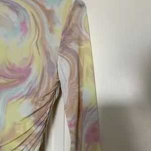 Revolve Anthropologie LONG SLEEVE RUCHED MESH TOP IN SKY MARBLE thumbnail 10