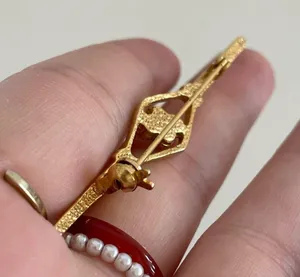 gold colored pin with Rhine stone detail thumbnail 2