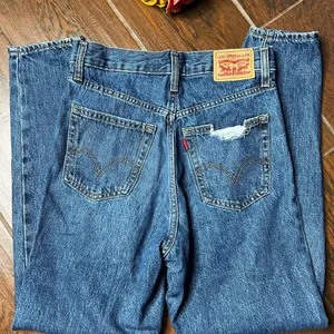 Levi's High Waisted Distressed Mom Denim Jeans thumbnail 5