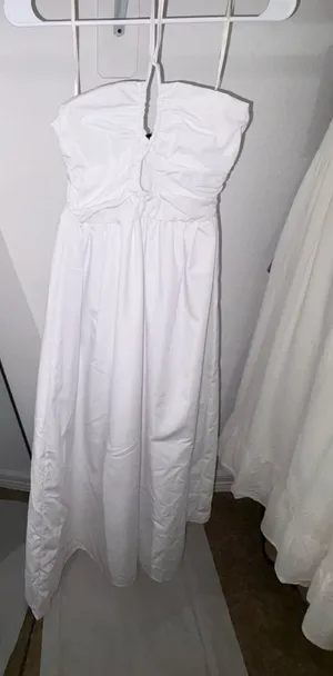 Forever 21 white halter/ tube maxi dress featuring a smocked back It is constructed with making it a staple piece for summer or vacation wear. thumbnail 1