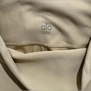 Alo 7/8 High Waist Airlift Legging, women’s size large in a gold/mustard color. thumbnail 4