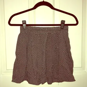 Brandy Melville Navy Floral Skirt thumbnail 1