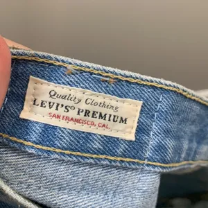 Levi's Premium 501 Button Fly Distressed/Ripped Light Wash Cutoff Jean Shorts thumbnail 3