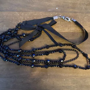 Triple strand layered black beaded bow necklace thumbnail 2