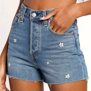Levi’s Ribcage Medium Wash High Rise Embroidered Cutoff Denim Shorts thumbnail 1