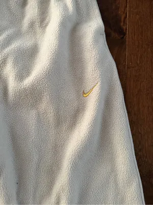 Nike Woman’s size Med Cream Sweatpants with Gold Swoosh Accent thumbnail 2