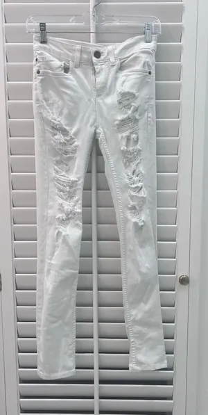 Alice + Olivia Distressed White Skinny Jeans thumbnail 1