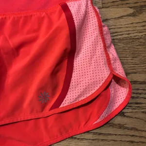 Athleta Acceleration Running Shorts Orange thumbnail 9