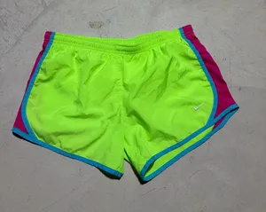 Nike Women's Neon Yellow-Green Running Shorts with Pink & Teal Trim large thumbnail 1