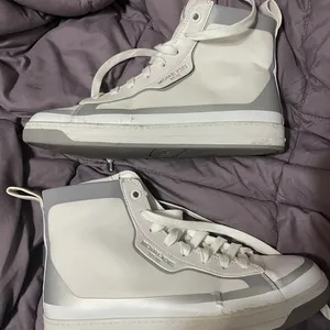 Michael kors boits. Never worn. See photos for peeling thumbnail 1
