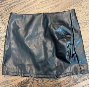 Black Faux Leather Mini Skirt NEW WITH TAGS. • thumbnail 1