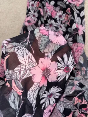 Flowy maxi Serong with an all-over pink floral pattern. Tie-waist detail for a customizable fit. Lightweight, breezy fabric for beach or pool wear. Feminine floral design ideal for vacation days. thumbnail 2
