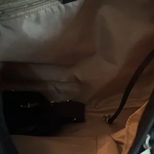 NOT FOR SALE. Kipling black bag with keychain , and extra strap. thumbnail 5