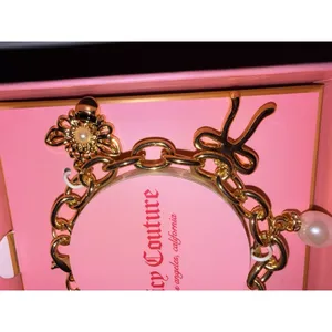 NIB Juicy Couture‎ Goldtone Charm Bracelet Charms Logo Y2K Bow Heart Pearl thumbnail 3
